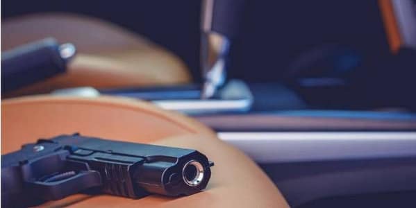 Thumbnail for: Can You Be Charged for a Gun Hidden Under Someone Else’s Car Seat?